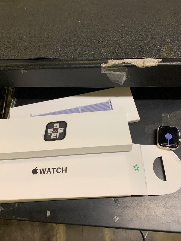 Photo 1 of Apple Watch SE (2nd Gen) [GPS 40mm] Smartwatch with Silver Aluminum Case with Blue Cloud Sport Loop One Size. Fitness and Sleep Trackers, Crash Detection, Heart Rate Monitor, Carbon Neutral