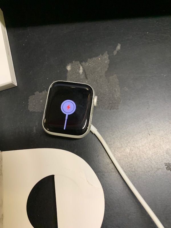 Photo 1 of Apple Watch SE (2nd Gen) [GPS 40mm] Smartwatch with Silver Aluminum Case with Blue Cloud Sport Loop One Size. Fitness and Sleep Trackers, Crash Detection, Heart Rate Monitor, Carbon Neutral