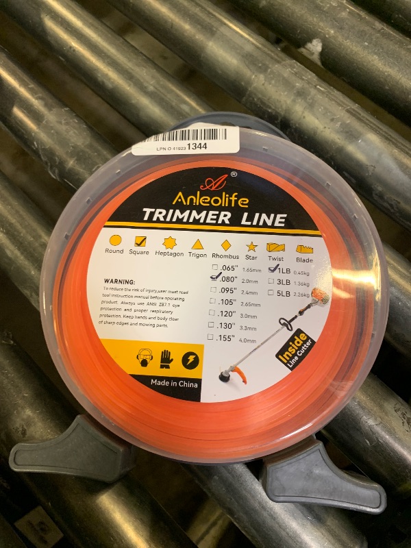 Photo 1 of A ANLEOLIFE 1-Pound Commercial Square .080-Inch-by-557-ft String Trimmer Line Donut,with Built-in Line Cutter, Orange