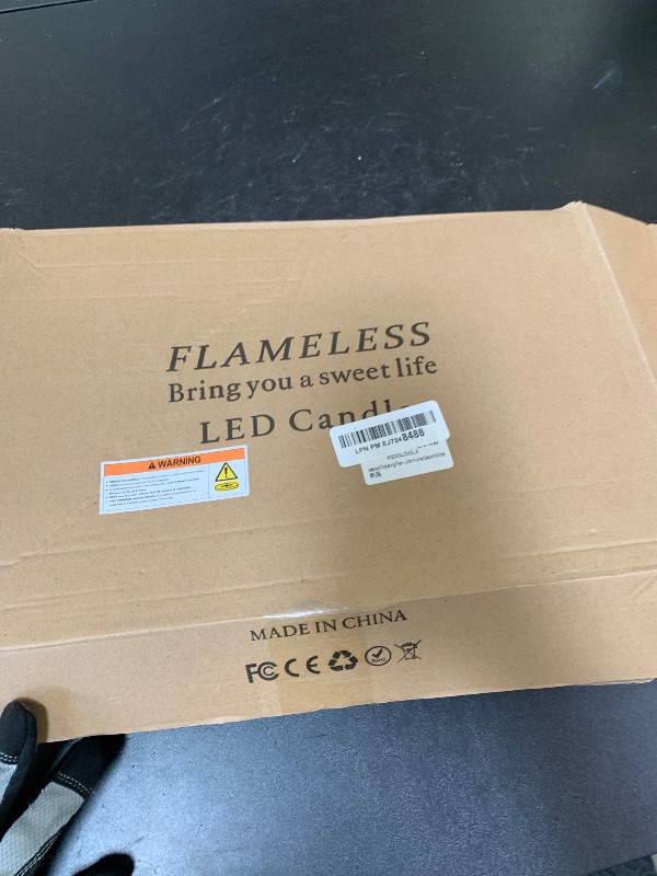 Photo 1 of kakoya Flickering Flameless Candles Battery Operated with Remote and 2/4/6/8 H Timer Plexiglass Led Pillar Candles Pack of 9 (D2.3"xH 6"7"8")with Realistic Moving Wick Candles for Home Decor(White)
