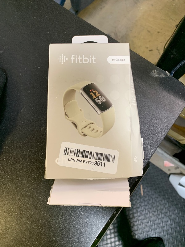 Photo 1 of Fitbit Charge 6 Fitness Tracker with Google apps, Heart Rate on Exercise Equipment, 6-Months Premium Membership Included, GPS, Health Tools and More, Porcelain/Silver, One Size (S & L Bands Included)