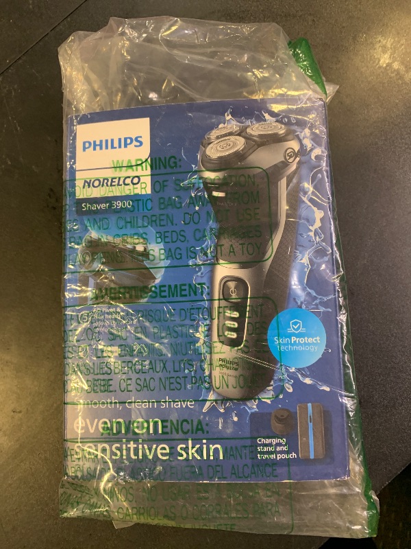 Photo 1 of Philips Norelco Shaver 3900 Series, Wet and Dry Electric Shaver, P-Cap, Travel Pouch, Charging Stand, Storm Blue, Model S3341/92