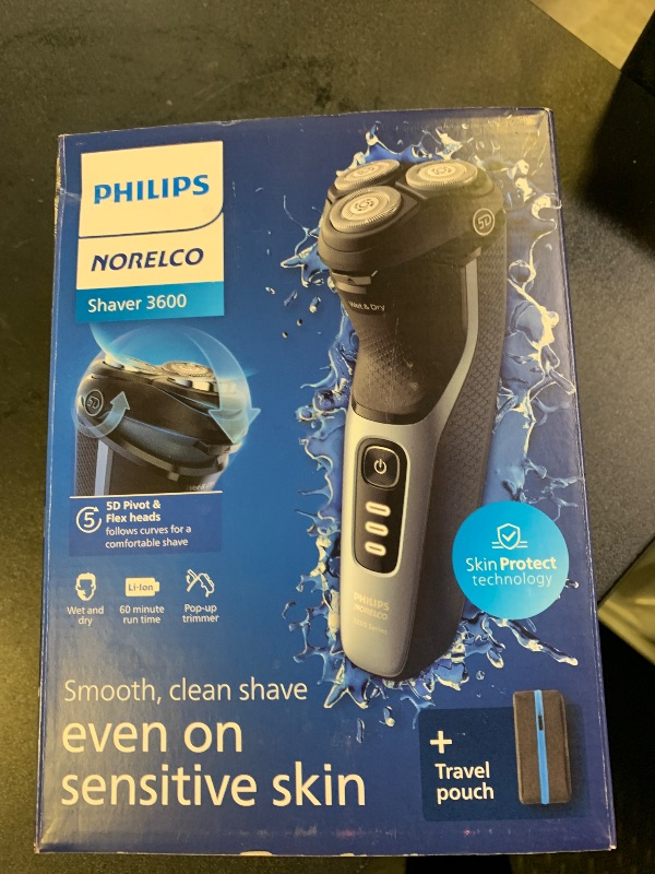 Photo 1 of Philips Norelco Shaver 3600 Series, Wet and Dry Electric Shaver, P-Cap, Travel Pouch, Storm Blue, Model S3243/91