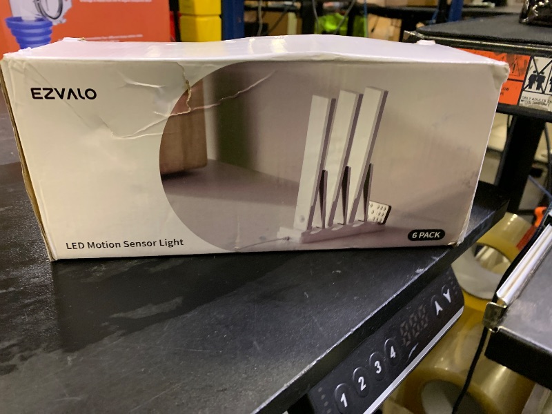 Photo 1 of EZVALO 6-Pack Under Cabinet Lighting with Charging Station, 2000mAh Rechargeable Wireless Motion Sensor Lights, 3 Color Temps, Dimmable, Timer, Magnetic, with Remote Control for Kitchen, Closet, Stair