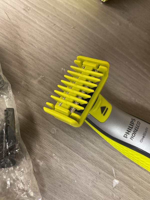Photo 1 of Philips Norelco OneBlade 360 Hybrid Blade for Face + Body, Electric Beard Trimmer, Shaver and Groomer, with 360 Blade Technology, 5in1 Adjustable Comb, 1x Body Kit, Model QP2834/70, Black/Lime Green