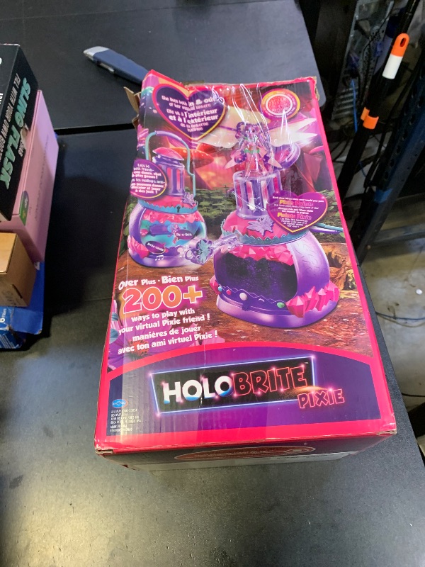 Photo 1 of Just Play HOLOBRITE Pixie Lantern, Virtual Dancing and Interactive Games, Includes 5-inch Pixie Doll, Over 200 Ways to Play, Kids Toys for Ages 6 Up