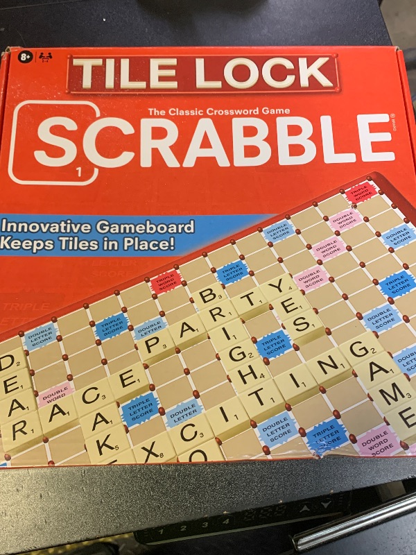 Photo 1 of Tile Lock Scrabble by Winning Moves Games USA, Innovative Gameboard Locks Tiles in Place, for 2 to 4 Players, Ages 8 and Up