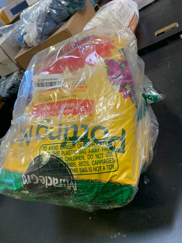 Photo 1 of Miracle-Gro Potting Mix, For Indoor or Outdoor Potted Plants, Flowers, Vegetables, Shrubs, Annuals, and Perennials, Feeds Up to 6 Months, 8 qt.