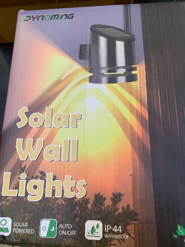 Photo 1 of Dynaming 4 Pack Solar Wall Lights, Stainless Steel Cover Outdoor Wall Sconce Lights, Cordless LED Lights Auto On/Off Mounted Fence Deck Light, Waterproof for Garage Stair Patio Porch Barn Yard