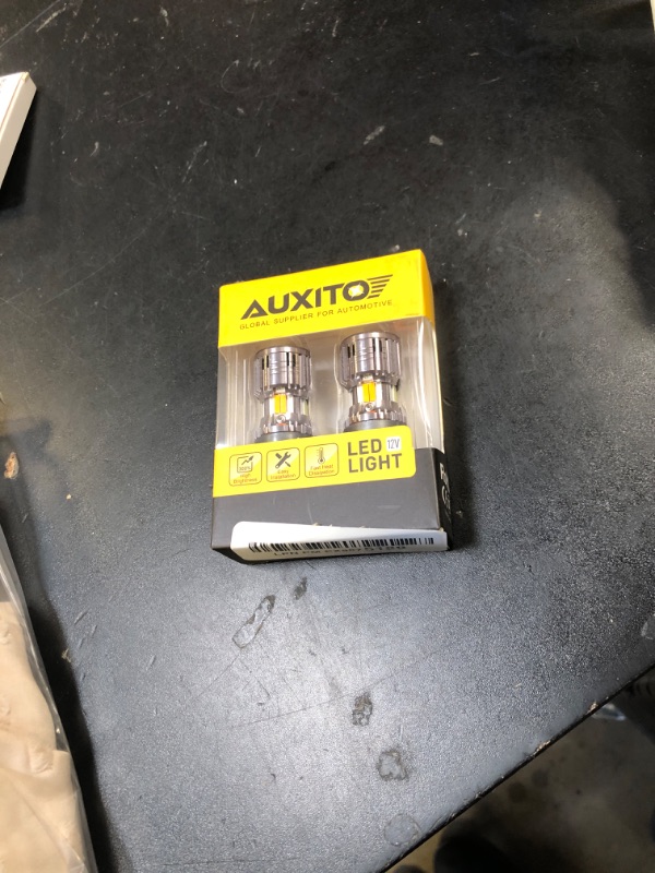 Photo 1 of AUXITO Latest CANBUS 3157 Switchback LED Bulbs 3057 3457 4157 Dual Color Amber/White Anti Hyper Flash Built-in Resistor Error Free Turn Signal Lights and DRL/Parking Lights, Pack of 2