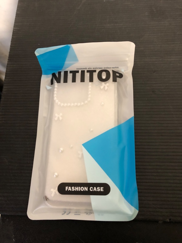 Photo 1 of NITITOP Compatible with iPhone 14 Pro Max Case Clear Cute for Women Girls Glitter with 3D Bowknot Pattern Pearl Design Bling Sparkly Protective Phone Cover - White