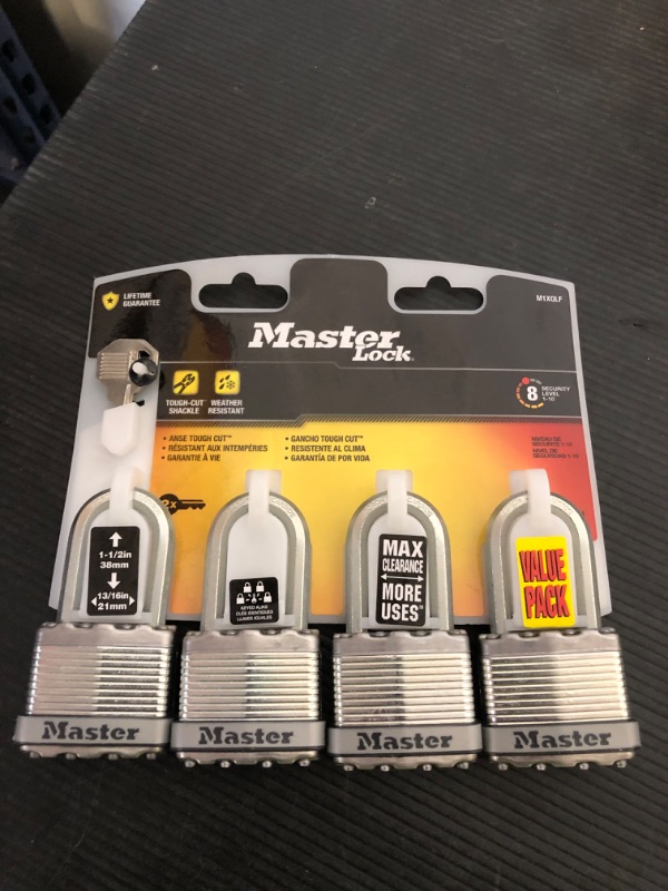 Photo 1 of Master Lock Silver Magnum Outdoor Padlock with Key, Keyed Alike Gate Locks for Outdoor Fence or Shed with Long Shackle, 4 Pack, M1XQLFCCSEN