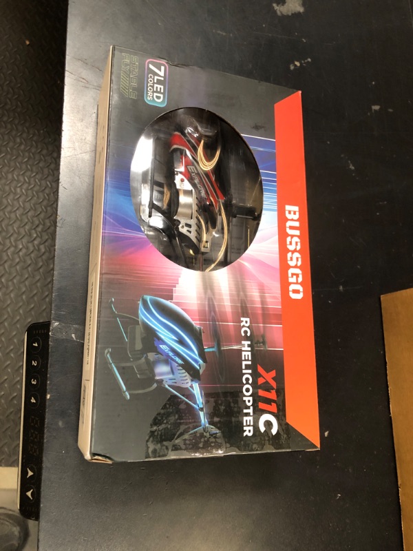 Photo 1 of BUSSGO RC Helicopter, Remote Control Helicopter for Kids with 30Mins Flight(2 Batteries), 7+1 LED Light Modes, Altitude Hold, RC Toys for Boys Girls