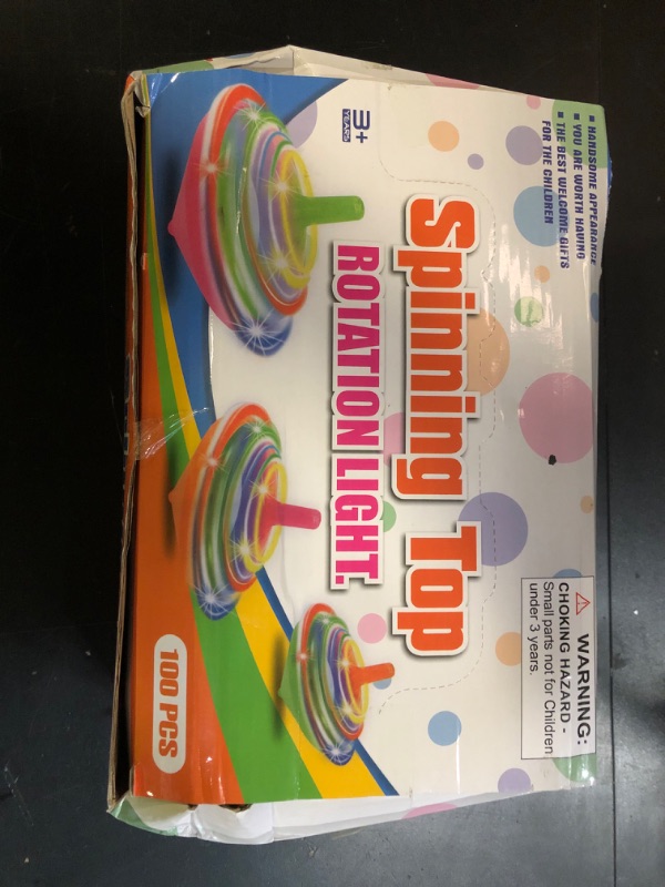 Photo 1 of 100 Pieces LED Light Up Flashing Mini Spinning Tops with Gyroscope - Kids Novelty Bulk Spin Toys Party Favors Bundle Pack Multicolored