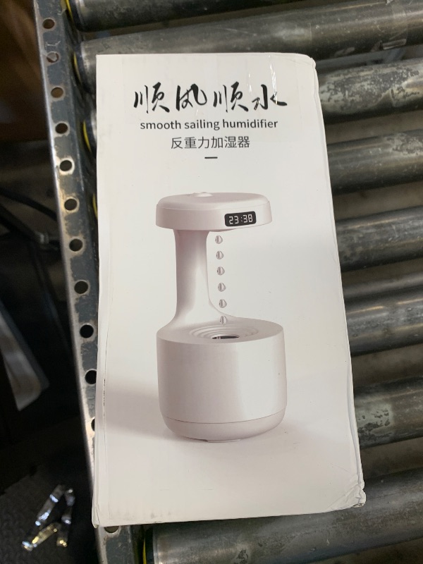 Photo 1 of PenRux Anti Humidifier, 800ml Hovering Water Drop Backflow Creative Humidifier Quiet USB Powered Mist Humidifier with Night Light and LED Clock Display for Home Office