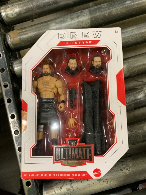 Photo 1 of Mattel WWE Ultimate Edition Action Figure & Accessories Set, Drew McIntyre 6-inch Collectible, Swappable Heads & Hands, 30 Articulation Points