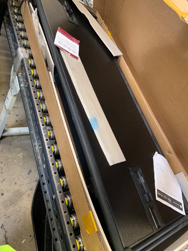 Photo 1 of Black foldable truck bed cover