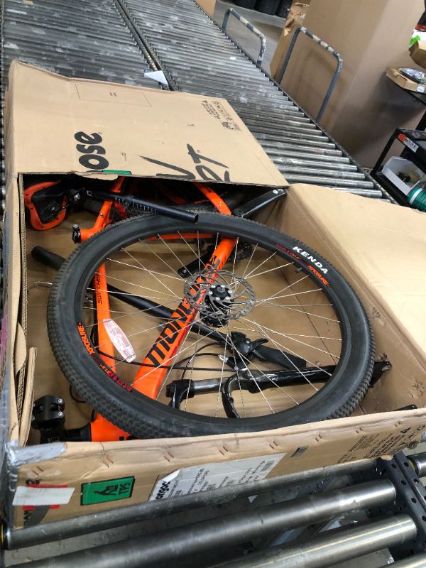 Photo 1 of Mongoose Switchback Sport Hardtail Mountain Bike for Adult Men Women, Front Suspension, 16-Speed, 27.5-Inch Wheels, Mechanical Disc Brakes, Medium Aluminum Frame, Orange
