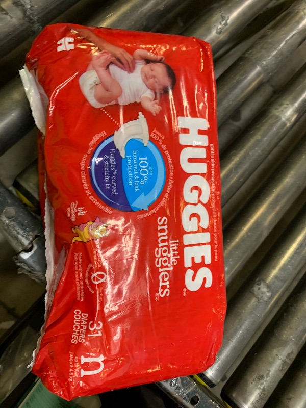 Photo 1 of Huggies Size Newborn Diapers, Little Snugglers Baby Diapers, Size Newborn (up to 10 lbs), 31 Count, Packaging May Vary
