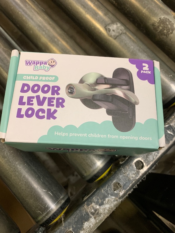 Photo 1 of Door Lever Lock (2 Pack) Prevents Toddlers from Opening Doors. 3.25" L * 1.5" W * 4.5" H Easy One Hand Operation for Adults. Durable ABS with 3M Adhesive Backing. Simple Install, Black
