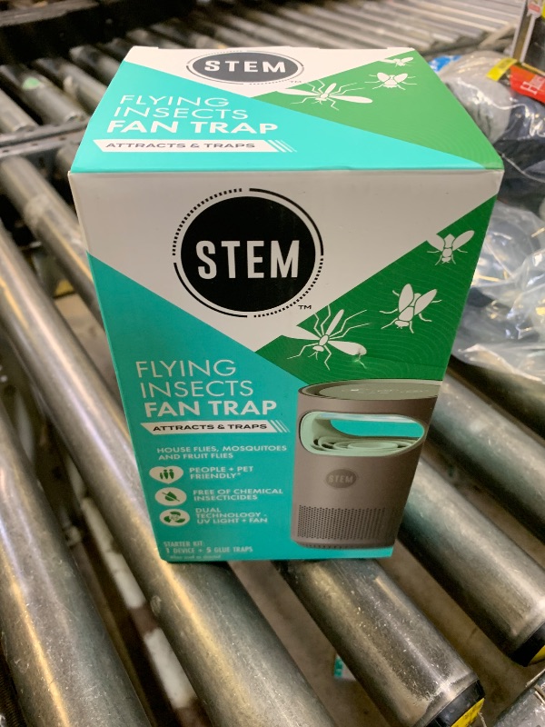 Photo 1 of STEM Flying Insect Fan Trap for Indoor Bug Control, Attracts Mosquitoes, Fruit Flies, and House Flies, Plug-in Fan with UV Light, Starter Kit Includes 1 Device and 5 Glue Traps