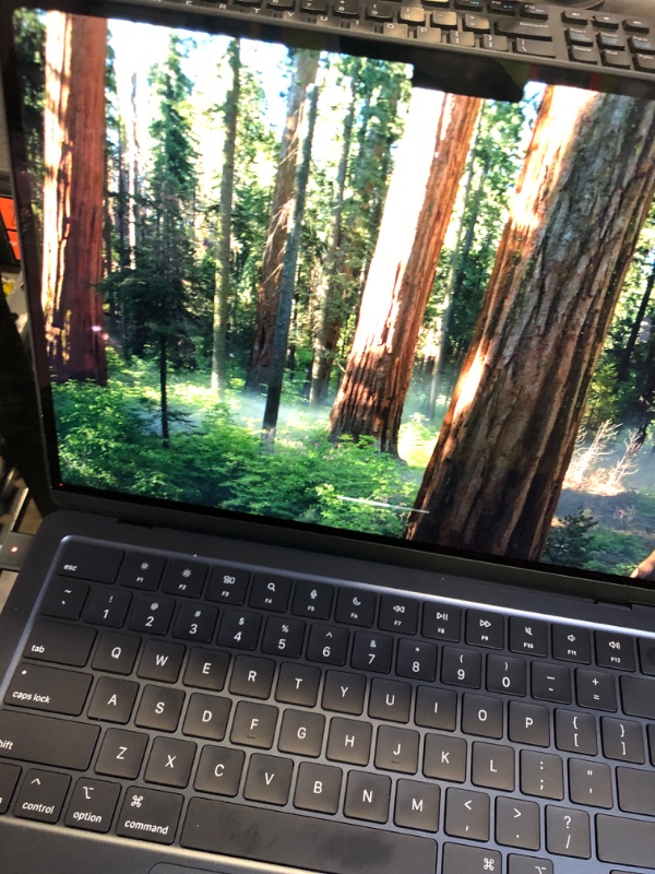 Photo 1 of Apple 2025 MacBook Air 13-inch Laptop with M4 chip: Built for Apple Intelligence, 13.6-inch Liquid Retina Display, 16GB Unified Memory, 256GB SSD Storage, 12MP Center Stage Camera, Touch ID; Midnight