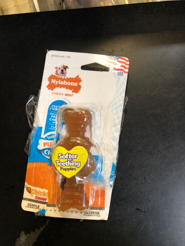 Photo 1 of Nylabone Ring Bone Chew Toy for Puppies, Puppy Teething Toys, Puppy Enrichment Toys, Chicken Flavor, X-Small Dogs - Up to 15 lbs, 1 Count