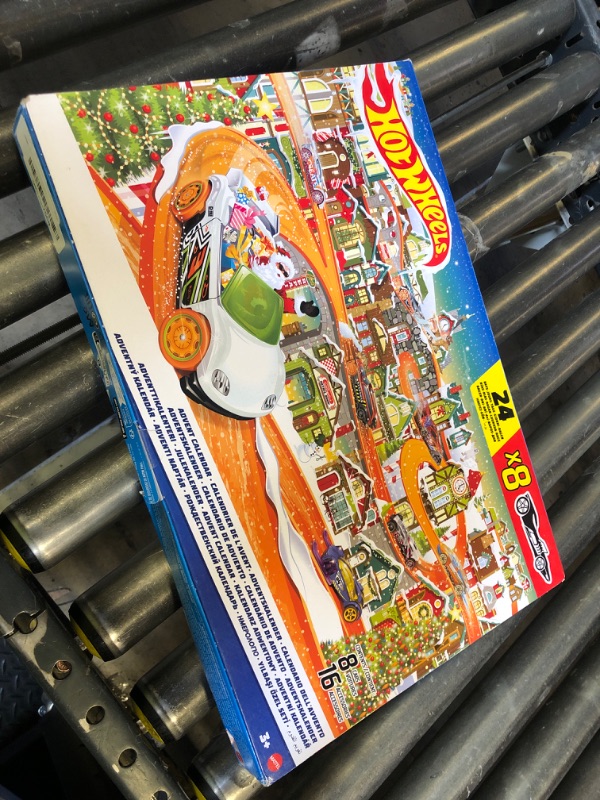 Photo 1 of Hot Wheels Toy Car Set, 2023 Advent Calendar with 8 1:64 Scale Vehicles, 16 Accessories & Playmat for Kids & Collectors