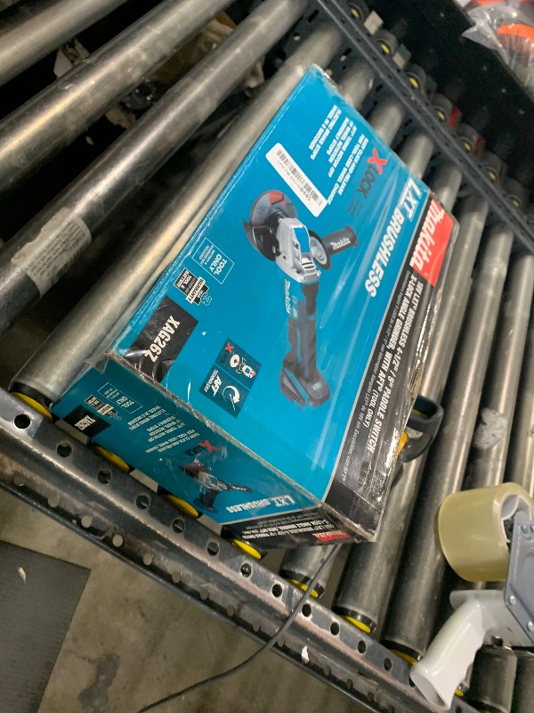 Photo 1 of Makita XAG26Z 18V LXT® Lithium-Ion Brushless Cordless 4-1/2” / 5" Paddle Switch X-LOCK Angle Grinder, with AFT®, Tool Only