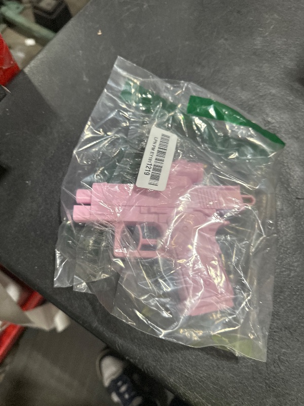 Photo 1 of Prank Water , 2025 Two-Way Water Gun Shoots Backward No Logo Spray from Front and Back, Fun Office & School Parties Pool Prank (Pink)