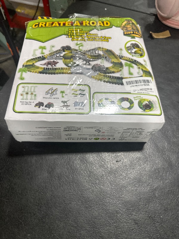 Photo 1 of Dinosaur Toys, 252 PCS Create A Dinosaur World Road Race Tracks, Flexible Track Playset, 2pcs Dinosaur Car for 3 4 5 6 Year Old Boys Girls Birthday Party Favor Gift