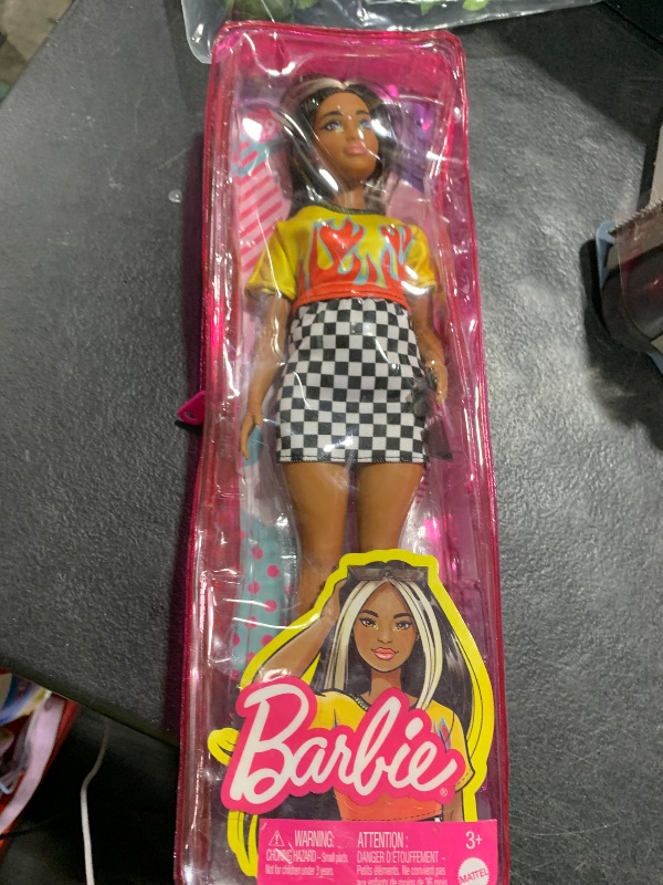 Photo 1 of Barbie Fashionistas Doll #179, Curvy with Long Highlighted Hair, Flame Crop Top, Checkered Skirt & Accessories Including Sneakers & Sunglasses