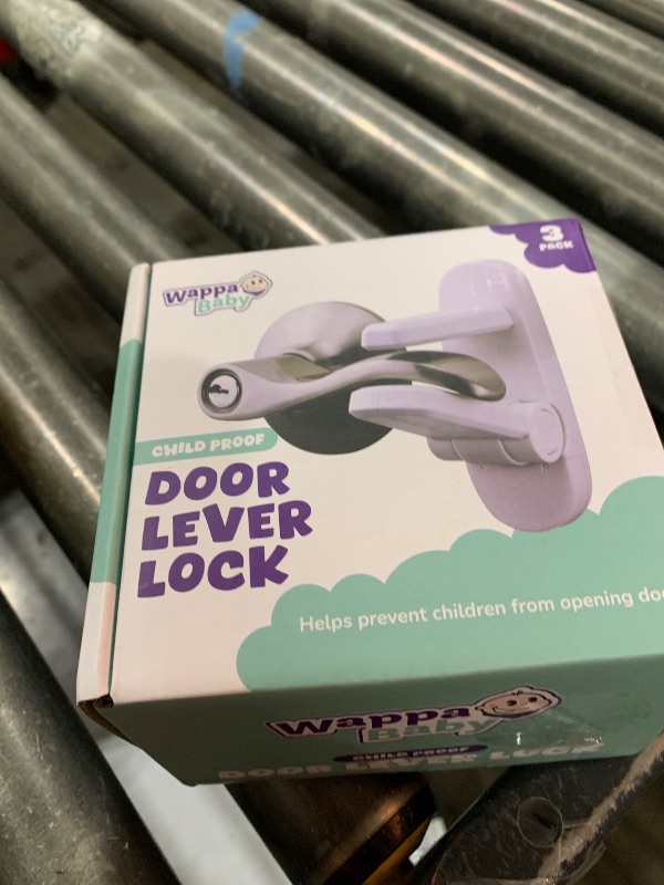Photo 1 of Door Lever Lock (3 Pack) Prevents Toddlers from Opening Doors. 3.25" L * 1.5" W * 4.5" H Easy One Hand Operation for Adults. Durable ABS with 3M Adhesive Backing. Simple Install, No Tools Needed.