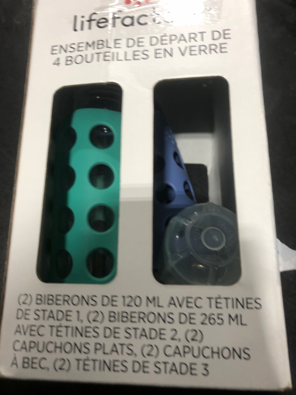 Photo 1 of Lifefactory Baby Bottle Starter Set 10-Piece | 4 oz Mint & Blanket, 9 oz Kale & Blueberry | Includes Flat Caps, Sippy Caps, Stage 2 Nipples