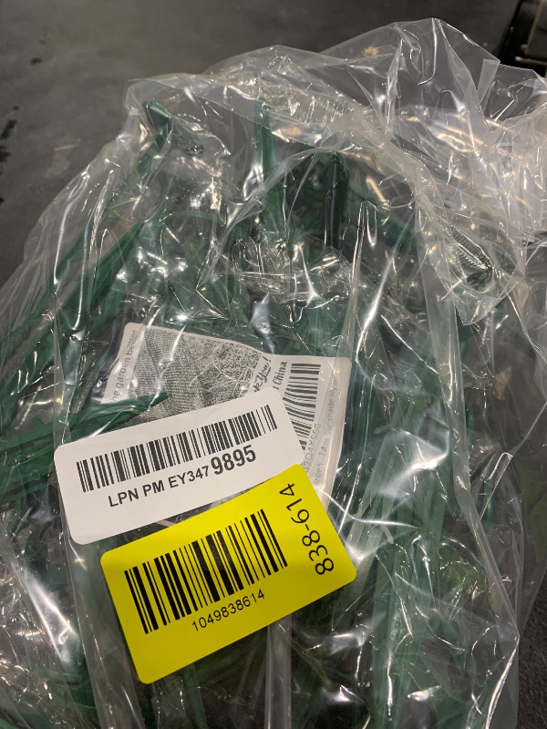 Photo 1 of TorSor 50 Pack Landscape Fabric Stakes Green Plastic 6.3" Landscape Staples Weed Barrier Pins Anchoring Spike Garden Stake for Woven Ground Cover Cloth Gardening Farming Yard Lawn Edging Weed Control