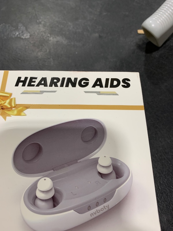 Photo 1 of OTC Hearing Aids for Seniors - Hearing Aids with Digital Chips, Supermini Rechargeable Hearing Amplifiers Invisible with 16-Channel Sound Processing 3 Volume and 80H Wireless Charging Case (White)