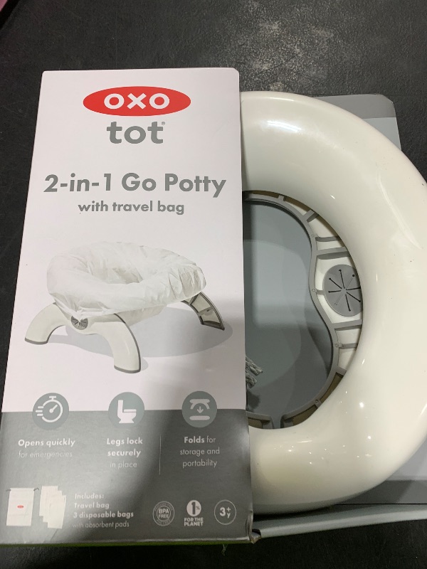 Photo 1 of OXO Tot 2-in-1 Go Portable Potty with Travel Bag, Travel Potty Seat for Toddler