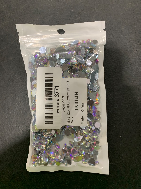 Photo 1 of Mixed 1400pcs AB Colour Gems Jewels Flatback Rhinestones, Assorted Shapes Rhinestone for Crafts, Face Art Gem Jewel for Crafting, Acrylic Gemstones DIY Halloween Party Decorations (White AB)