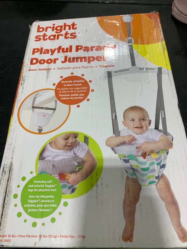 Photo 1 of Bright Starts Playful Parade Door Jumper for Baby with Adjustable Strap, 6 Months and Up, Max Weight 26 lbs