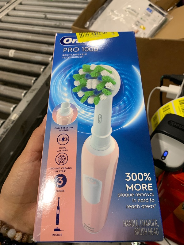 Photo 1 of Oral-B Pro 1000 Rechargeable Electric Toothbrush, Pink