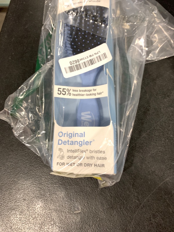 Photo 1 of Wet Brush Detangling Brush, Original Detangler Brush (Sky) - Wet & Dry Tangle-Free Hair Brush for Women & Men - No Tangle Soft & Flexible Bristles for Straight, Curly, & Thick Hair