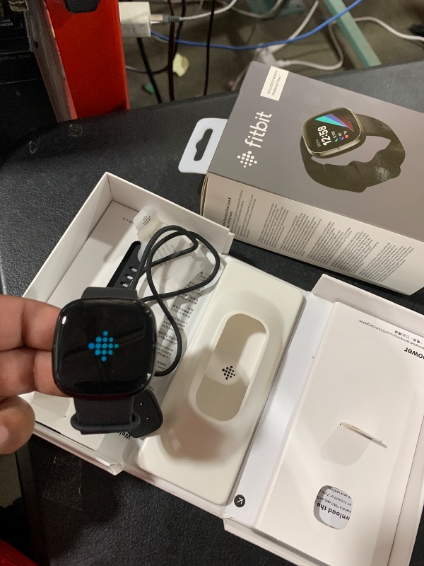 Photo 1 of Fitbit Sense Advanced Smartwatch with Tools for Heart Health, Stress Management & Skin Temperature Trends, Carbon/Graphite, One Size (S & L Bands Included)