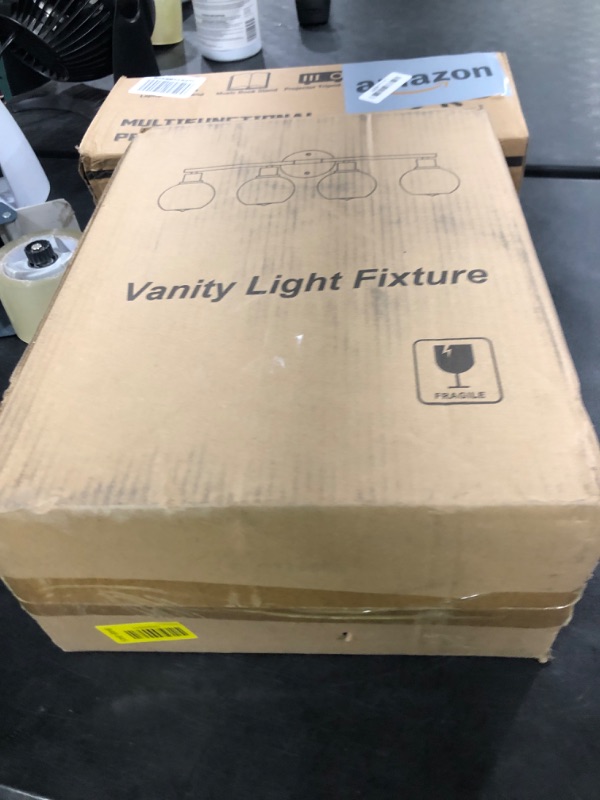 Photo 1 of 2025 Upgrade 4-Light Bathroom Light Fixtures, Black Bathroom Lights Over Mirror with Clear Glass Globe Shade, Vanity Lights for Bathroom Kitchen Living Room Hallway Cabinet Bedroom Porch