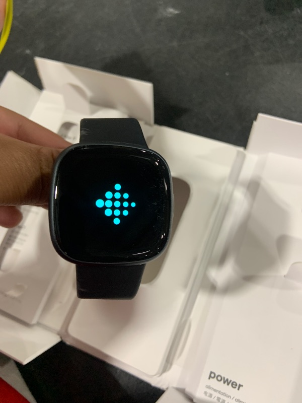 Photo 1 of Fitbit Versa 4 Fitness Smartwatch with Daily Readiness, GPS, 24/7 Heart Rate, 40+ Exercise Modes, Sleep Tracking and more, Black/Graphite, One Size (S & L Bands Included)