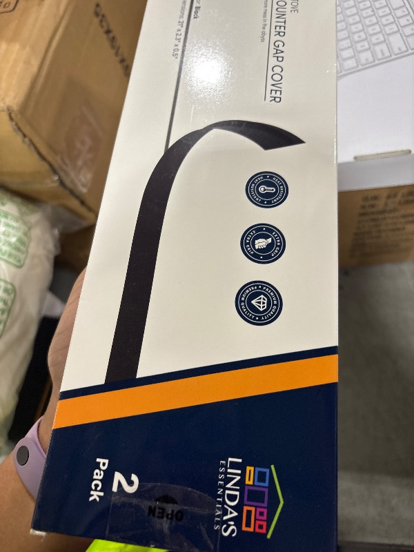 Photo 1 of Linda’s Essentials Silicone Stove Gap Covers (2 Pack), Heat Resistant Oven Gap Filler Seals Gaps Between Stovetop and Counter, Easy to Clean Stove Gap Guard (21 Inches, Black)