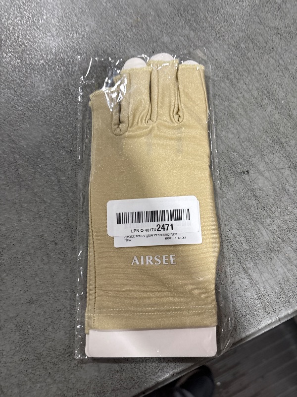 Photo 1 of AIRSEE UV Gloves for Nail Lamp,Professional UPF50+ UV Protection Gloves for Manicures Nail Art,Fingerless Gloves That Shield Skin from The Sun and Nail Lamp (Nude)