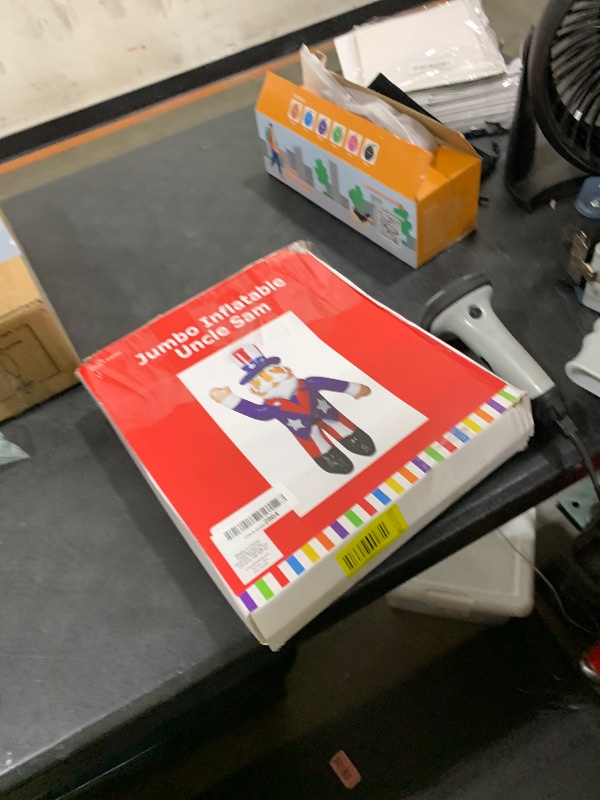 Photo 1 of Fun Express 64" Jumbo Inflatable Uncle Sam in Red, White & Blue Suit Decoration - Great for Memorial Day, 4th of July and All Patriotic Events