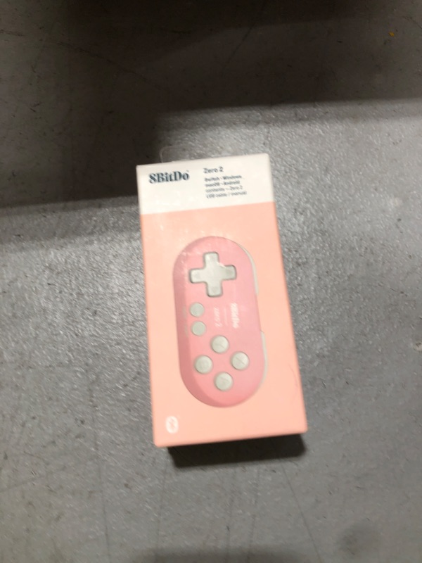 Photo 1 of 8Bitdo Zero 2 Bluetooth Key Chain Sized Mini Controller for Nintendo Switch, Windows, Android and macOS (Pink Edition)