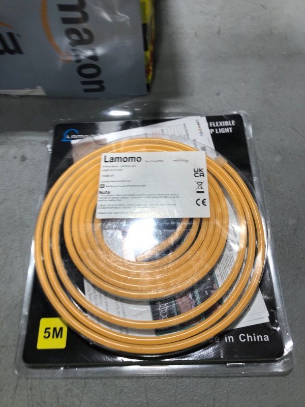Photo 1 of Lamomo LED Neon Lights, 16.4ft Orange Halloween Decorations 0.39In/Cut Neon Light Strip, 12V Flexible Waterproof LED Strip,Silicone Neon Rope Light for Indoor Outdoor Decor?Power Adapter not Included