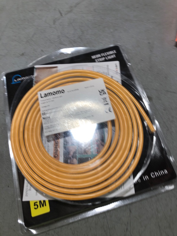 Photo 1 of Lamomo LED Neon Lights, 16.4ft Orange Halloween Decorations 0.39In/Cut Neon Light Strip, 12V Flexible Waterproof LED Strip,Silicone Neon Rope Light for Indoor Outdoor Decor?Power Adapter not Included